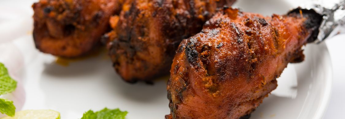 Authentic butter chicken and chicken tikka masala at Tandoori Grill Indo-Chinese downtown Calgary