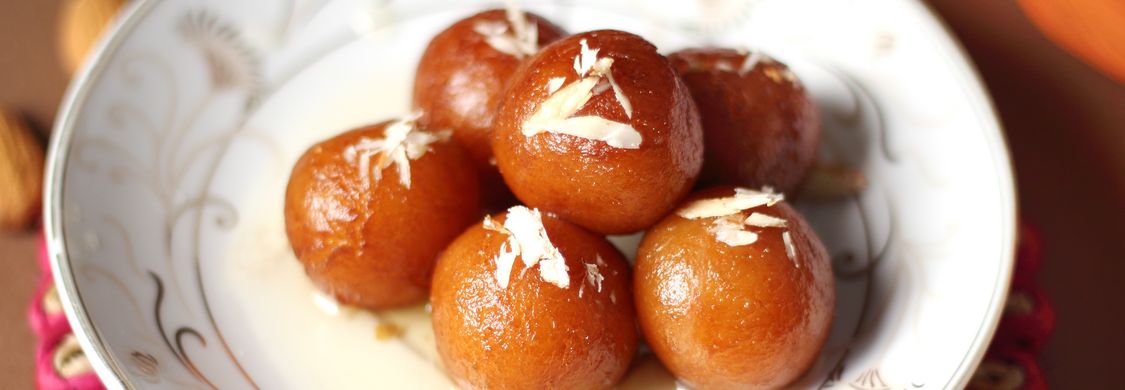 Fresh tandoori chicken and garlic naan from clay oven at Calgary Indian restaurant